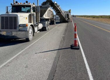 asphalt truck on SH 302